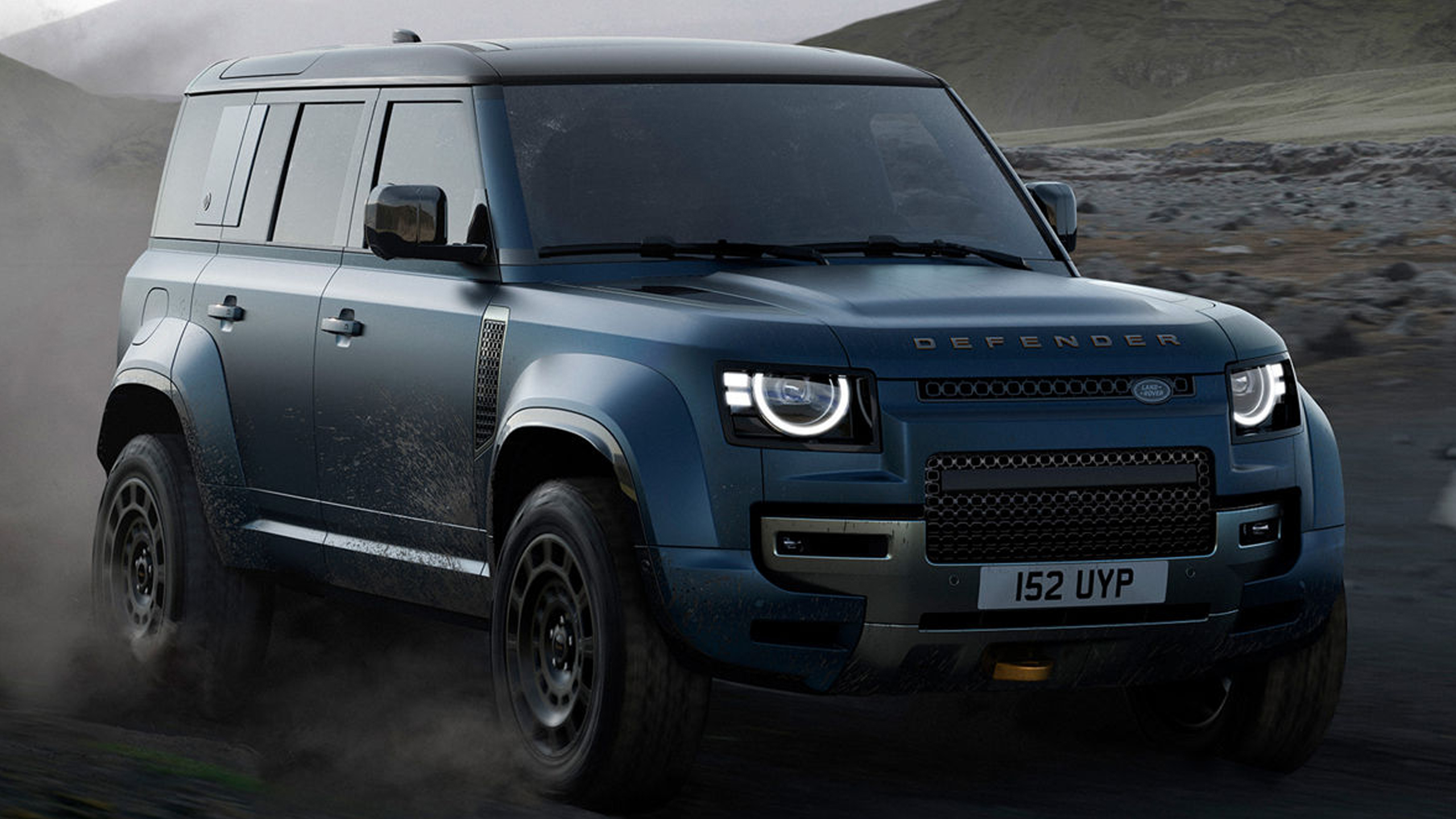 Defender drifiting on mountain road
