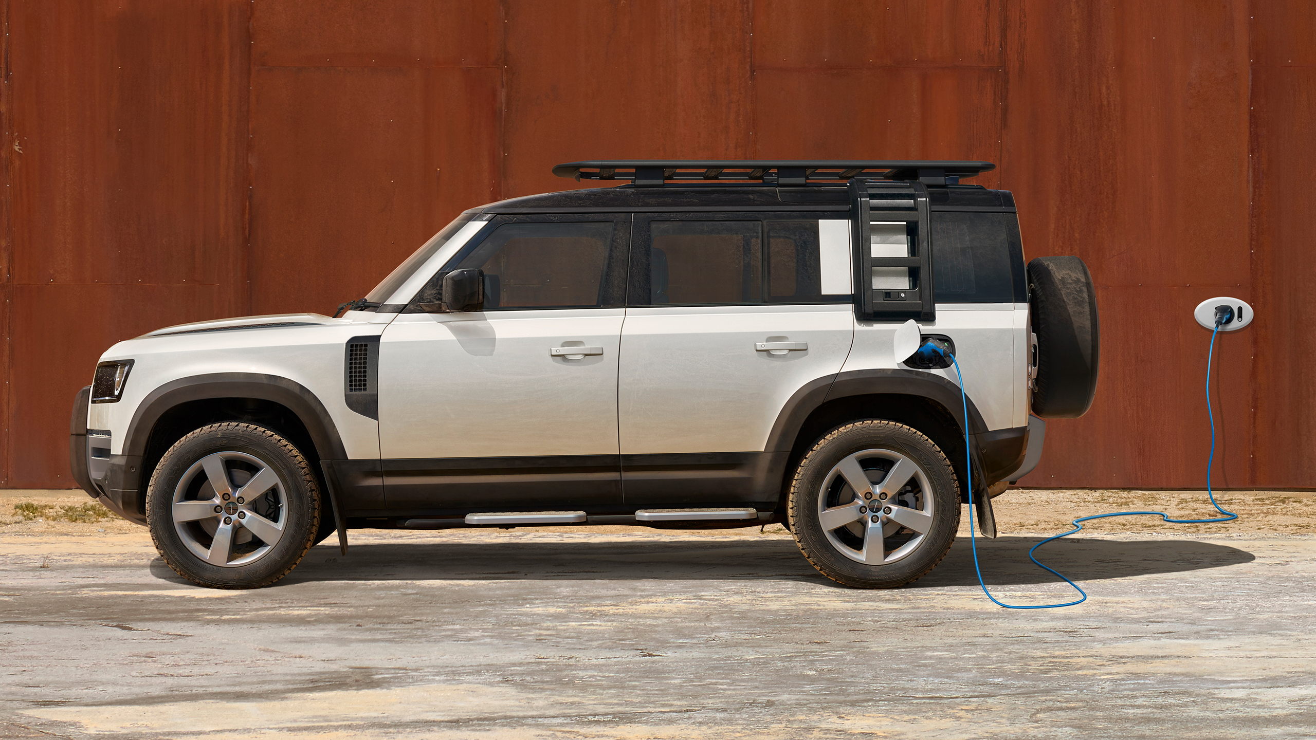 Defender parked on charging point