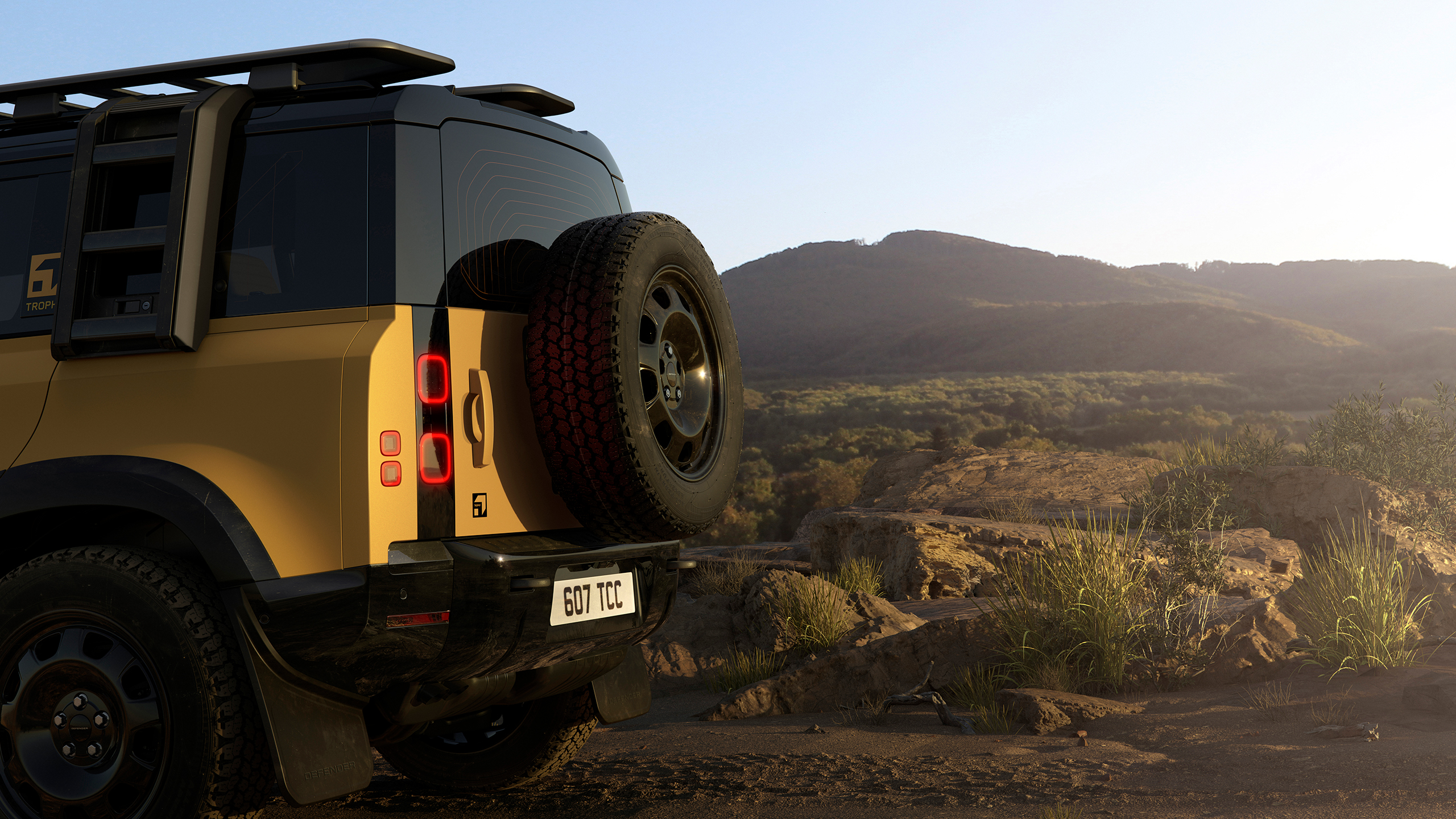 Defender parked on hill road